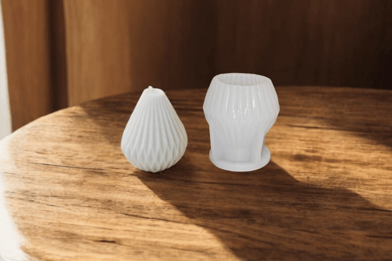 Moule pour la fabrication d'une bougie moulée en forme de poire design