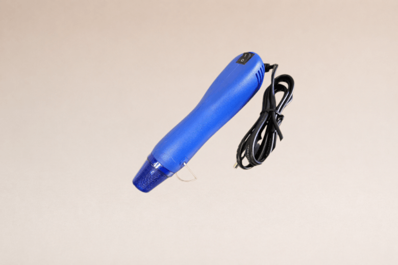 Pistolet thermique pour embellir et lisser la surface des bougies
